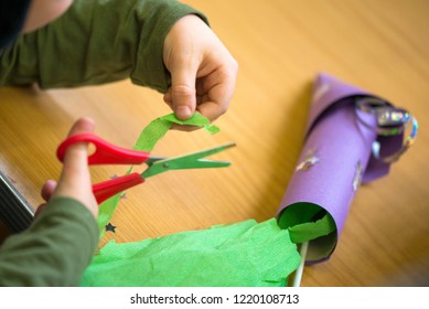 Kids Making Crafty Things With Scissors And Glue