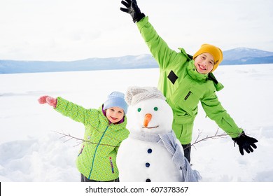 Kids Making A Snowman