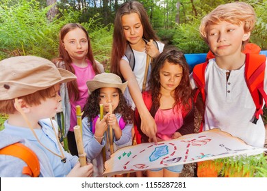 Kids With Map On Treasure Hunt Navigation Activity