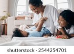 Kids, mom or baby on floor playing for child development, support or care in family home. Siblings, fun games or toddler with smile, happy parent or mother for bonding, wellness or love with health