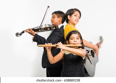 Kids And Music Concept - Cute Little Indian Kids Playing Musical Instruments As A Team Or Band, Over White Background