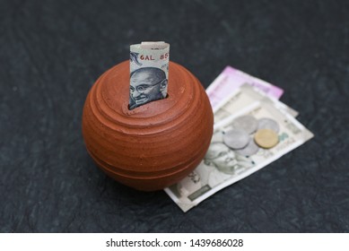 Kids Piggy Bank Or Coin  Stack Jar For Money Savings Cash Deposit For Future. 500 Rupee Banknote India. Success And Profit From Business. 500, 2000, New Indian Currency Notes.