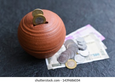 Kids Piggy Bank Or Coin  Stack Jar For Money Savings Cash Deposit For Future. 500 Rupee Banknote India. Success And Profit From Business. 500, 2000, New Indian Currency Notes.