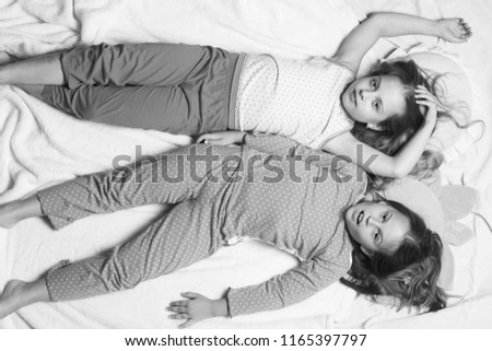Similar – Image, Stock Photo Relaxed mother and sons playing over the bed