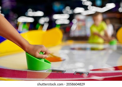 Kids Play Air Hockey In Entertainment Center