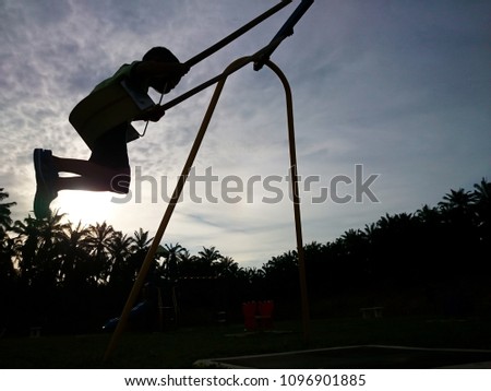 Similar – lovely little girl on a children’s slide