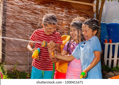 Kids Play Shooting Water Gun Game, Hot Summer Day