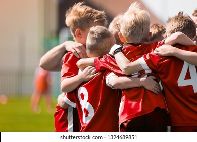 Kids Play Sports Game. Children Sporty Team United Ready to Play Game. Children Team Sport. Youth Sports For Children. Boys in Sports Jersey Red Shirts. Young Boys in Soccer Sportswear