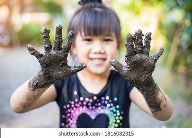 Kids Playing With Clay Muddy. This Activity Is Good For Sensory Experience And Learning By Touch Their Hands And Fingers Through Clay And Enjoying Its Texture.