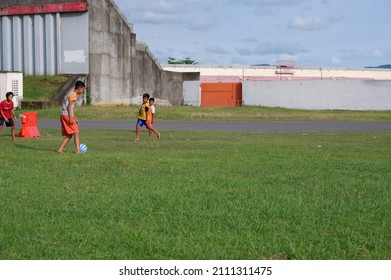 Kids Are Playing Football On The Field. January 23, 2022, Yogyakarta, Indonesia Bangunan Stadion Sultan Agung Di Bantul Untuk Bermain Sepakbola Dan Olah Raga