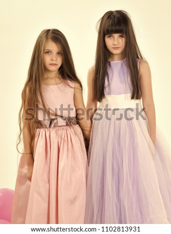 Kids playing - happy game. Beauty, fashion, punchy pastels. 