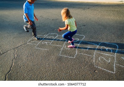 Kids Playing Hopscotch On Playground Stock Photo 1064377712 | Shutterstock