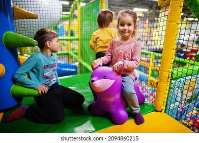 Kids Playing In Indoor Play Center. Kindergarten Or Preschool Play Room. 