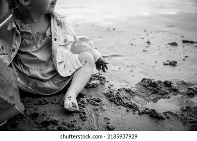 Kids Playing On The Beach