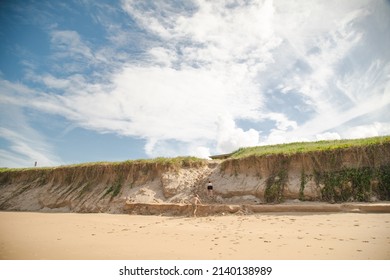 Kids Playing On The Sand Dunes At The Beach, Coffs Harbour Australia