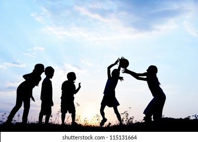 Kids Playing Outdoors With Ball