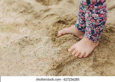 Kids Playing In The Sands. This Activity Is Good For Sensory Experience And Learning By Touch Their Fingers And Toes Through Sand And Enjoying Its Texture.