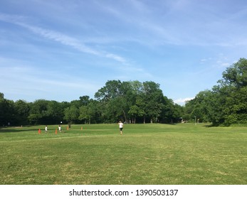 Kids Playing Soccer With Dad/Coach