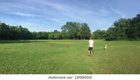 Kids Playing Soccer With Dad/Coach