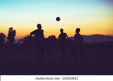 kids are playing soccer football