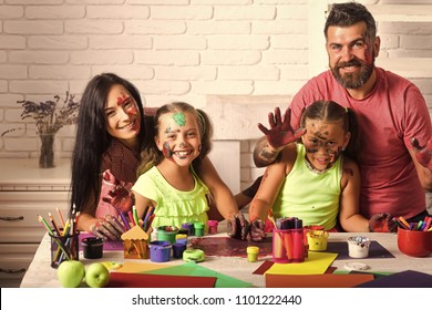 Kids Playing With Toys. Arts And Crafts. Girls Painters Painting With Mother And Father. Entertainment, Cosplay Party And Holiday. Learning And Playing Concept. Happy Family Showing Hands Colored In