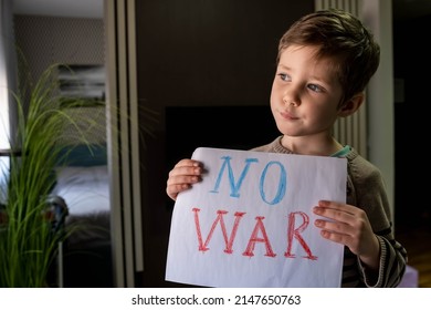 Kids Is Protesting. Activism Concept. Request For Help To World Community. Caring For Each Other. Kids With Poster With Banner Of Russia Conflict. Military Protest. Child With Message Stop War.