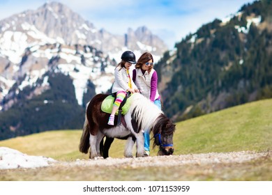 Download Boy Riding Pony High Res Stock Images Shutterstock