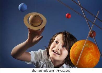 Kids And Science, Self Made Solar System Project - Studio Shots With Young Happy Boy