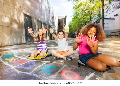 Kids Show Palms Colored In Chalk Drawing Game