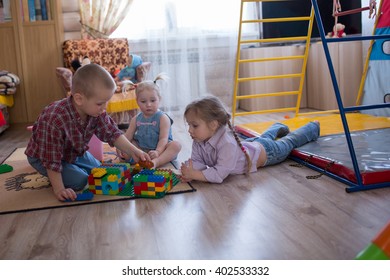 Kids Siblings Brother And Sisters Playing In The Constructor, Casual Lifestyle Photo Series In Real Life Interior,big Family