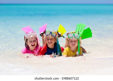 Kids snorkel. Beach fun. Children snorkeling in tropical sea on family summer vacation on exotic island. Child with mask and fins. Travel with kid. Little boy and girl learning to dive. Diving holiday - Powered by Shutterstock