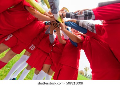 Kids Soccer Football Team In Huddle