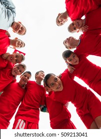 Kids Soccer Football Team In Huddle