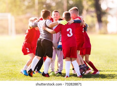 Kids Soccer Football - Young Children Players Celebrating After Match On Soccer Field