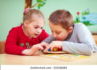 Kids With Special Needs Develop Their Fine Motor Skills In Daycare Rehabilitation Center