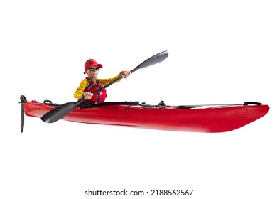 Kids and sport. Beginner kayaker in red canoe, kayak with a life vest and a paddle isolated on white background. Concept of sport, nature, travel, active lifestyle. Copy space for ad, text, design
