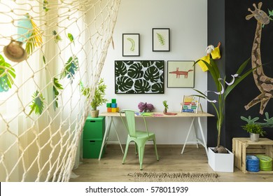 Kids Study Space With Desk, Green Chair And Blackboard Wall