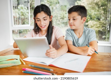 Kids Studying Education With Digital Tablet For Online School Work Or Homework Together At Home. Intelligent Distance Learning Students, Children Or Siblings Of Brother And Sister Help With Lesson.