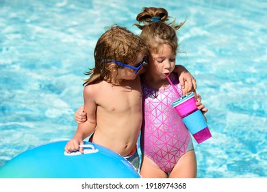 Kids summer weekend holidays. Summertime vacation. Couple of children in swimming pool - Powered by Shutterstock