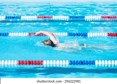 Kids Swim Meet In Outdoor Pool During The Summer.