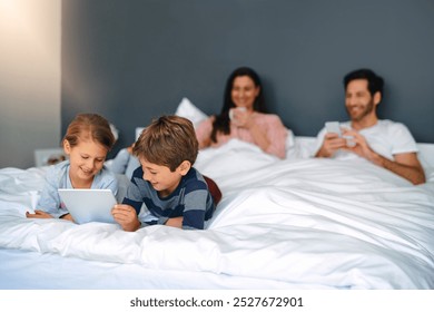 Kids, tablet and happy on bed in home for education games, watching cartoon or siblings bonding. Children, digital app or smile with parents in bedroom for online video, streaming service and playing - Powered by Shutterstock