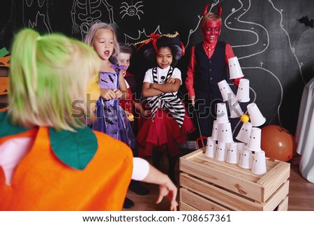 Kids taking part in halloween party 