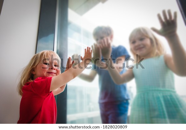 kids talking through window, isolation and\
social distancing