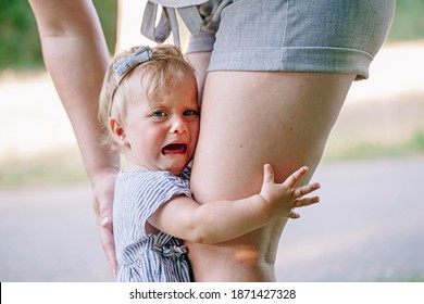 Kids Toddlers Tantrum. Crying Baby Girl In Park Outdoor. Mother Pacifying Sad Upset Crying Toddler Girl. Bonding Relationship Of Mom Parent And Child Baby. Early Childhood Troubles Problems.