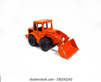 Kids Toy Tractors Toy Heavy Excavator Isolated Yellow Tractor Toy On A White Kids Toy Tractors Toy Heavy Excavator Isolated Yellow Tractor Toy On A White
