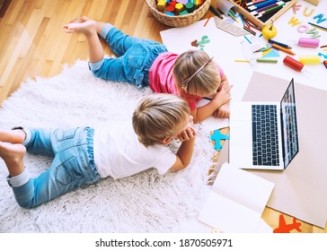 Kids Using Computer Online Technology To Art Creative, Drawing Or Making Crafts. Preschool Children Distance Online Education. Family Leisure With Little Children At Home Or Daycare.