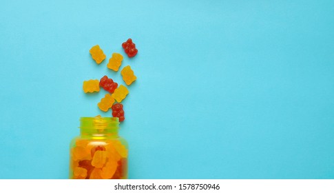 Kids Vitamins On Blue Background.