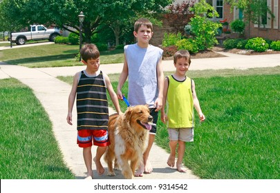 Kids Walking The Dog