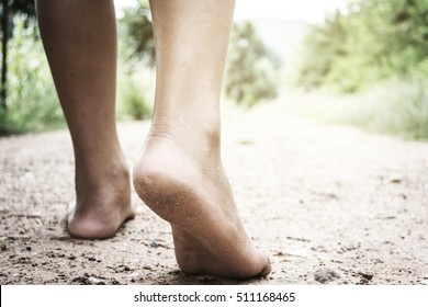 Kids Walking On Bare Feet With Blurry Background, Poverty Concept