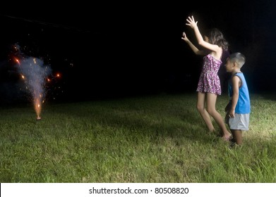 Kids Watching Fireworks Go Off.